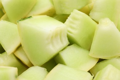 Photo of Many pieces of sweet honeydew melon, closeup