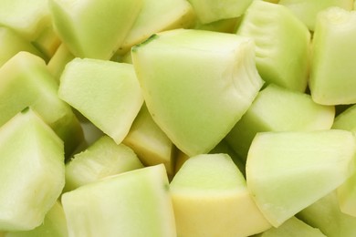 Photo of Many pieces of sweet honeydew melon, closeup