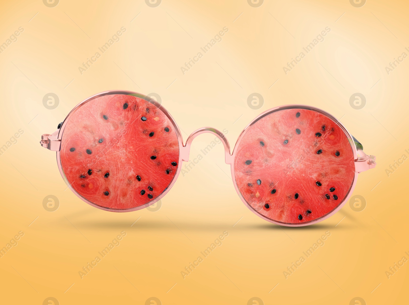 Image of Sunglasses with juicy watermelon in air on orange background. Summer vibe