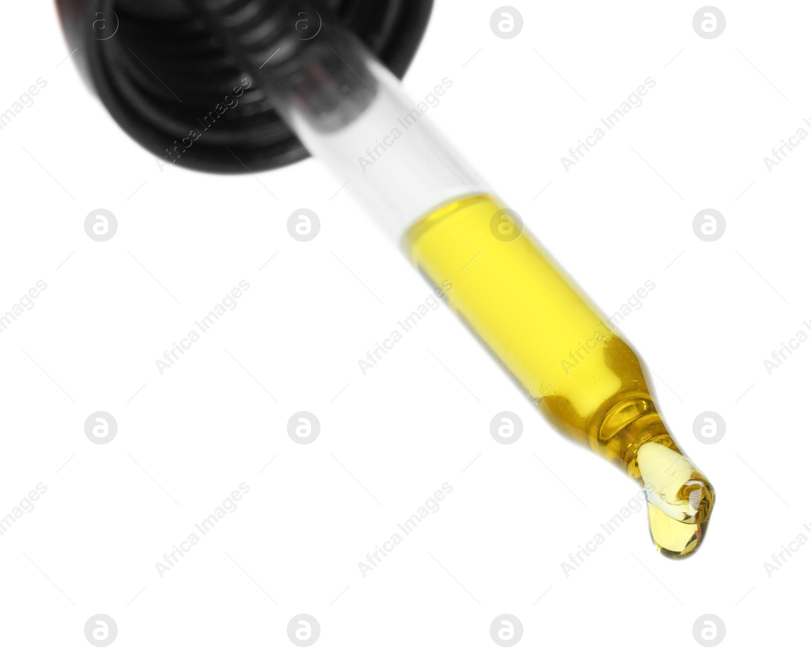 Photo of Dripping essential oil from pipette on white background