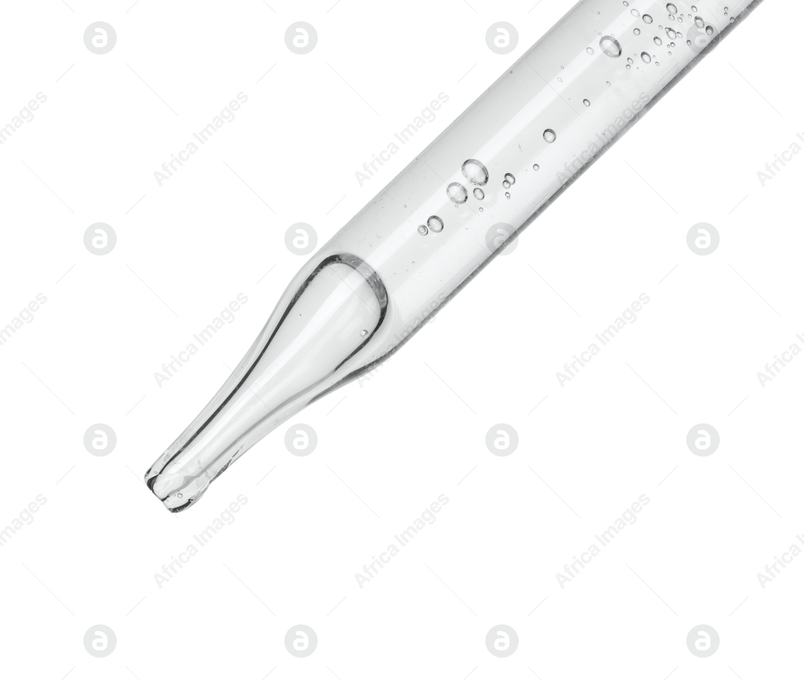 Photo of Dripping cosmetic serum from pipette on white background