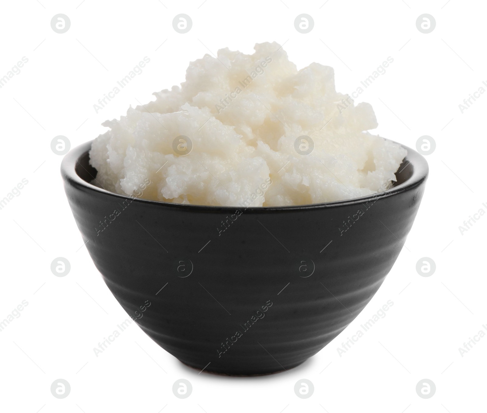 Photo of Natural shea butter in bowl isolated on white