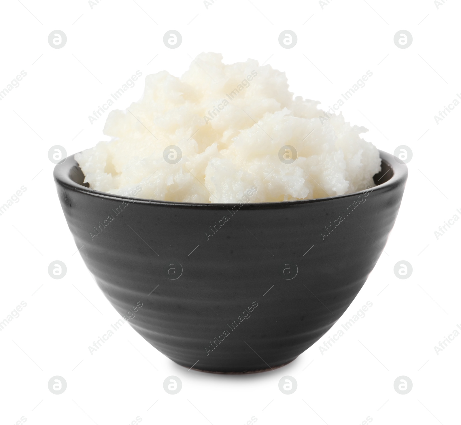 Photo of Natural shea butter in bowl isolated on white