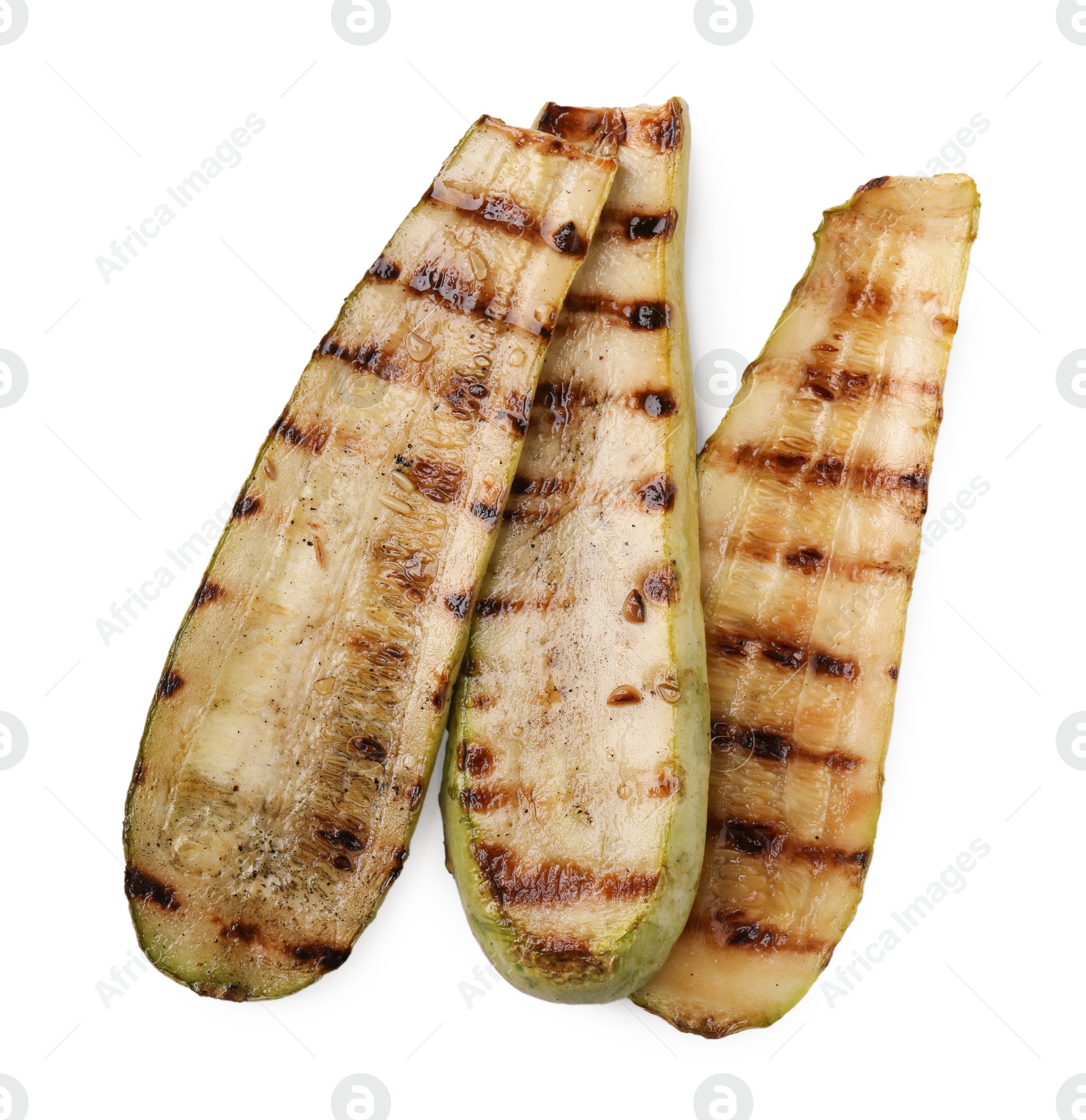 Photo of Tasty grilled courgette slices isolated on white, top view