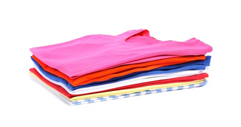 Photo of Stack of colorful clothes isolated on white