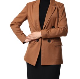 Woman in brown jacket and black dress on white background, closeup