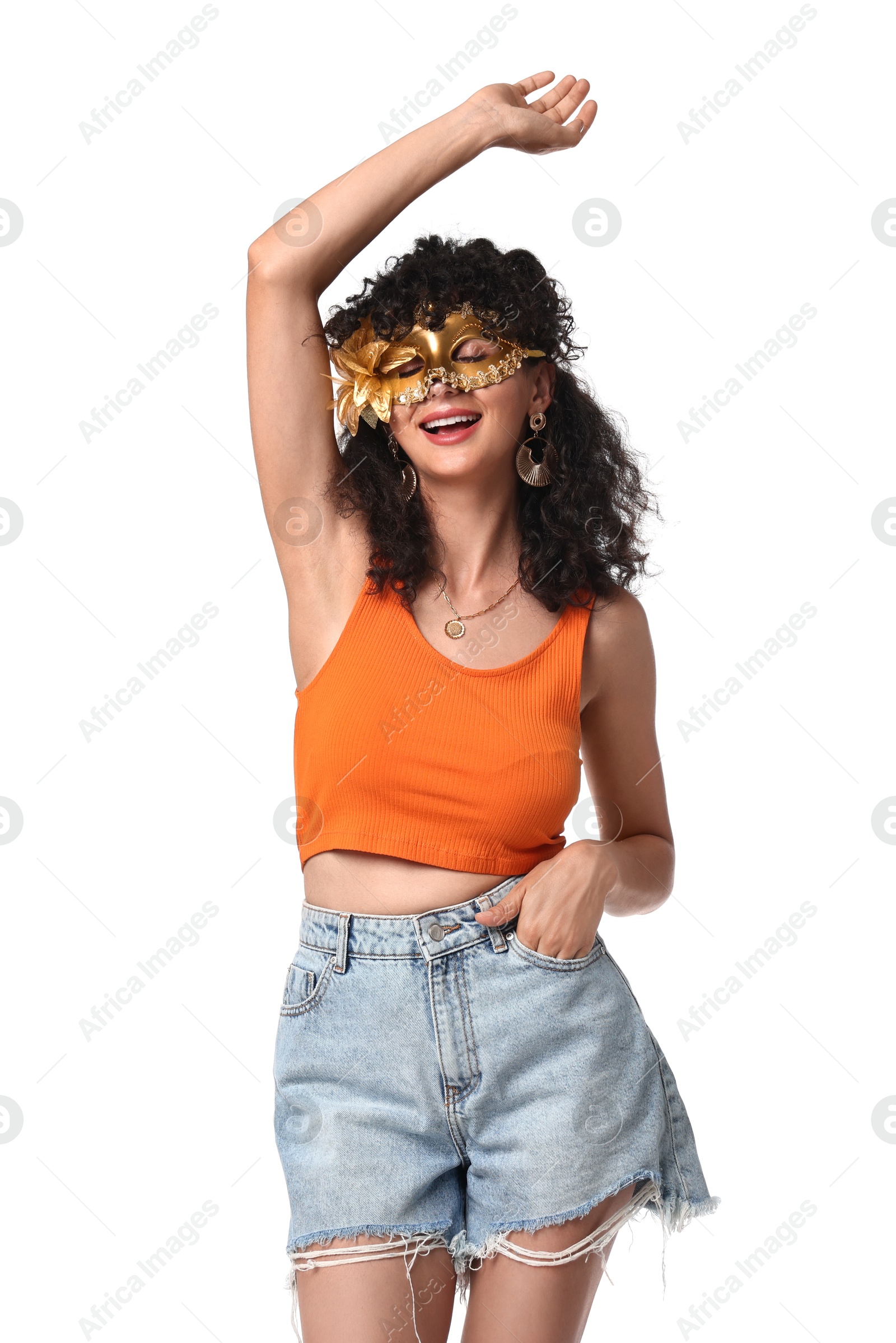 Photo of Smiling young woman in carnival mask isolated on white