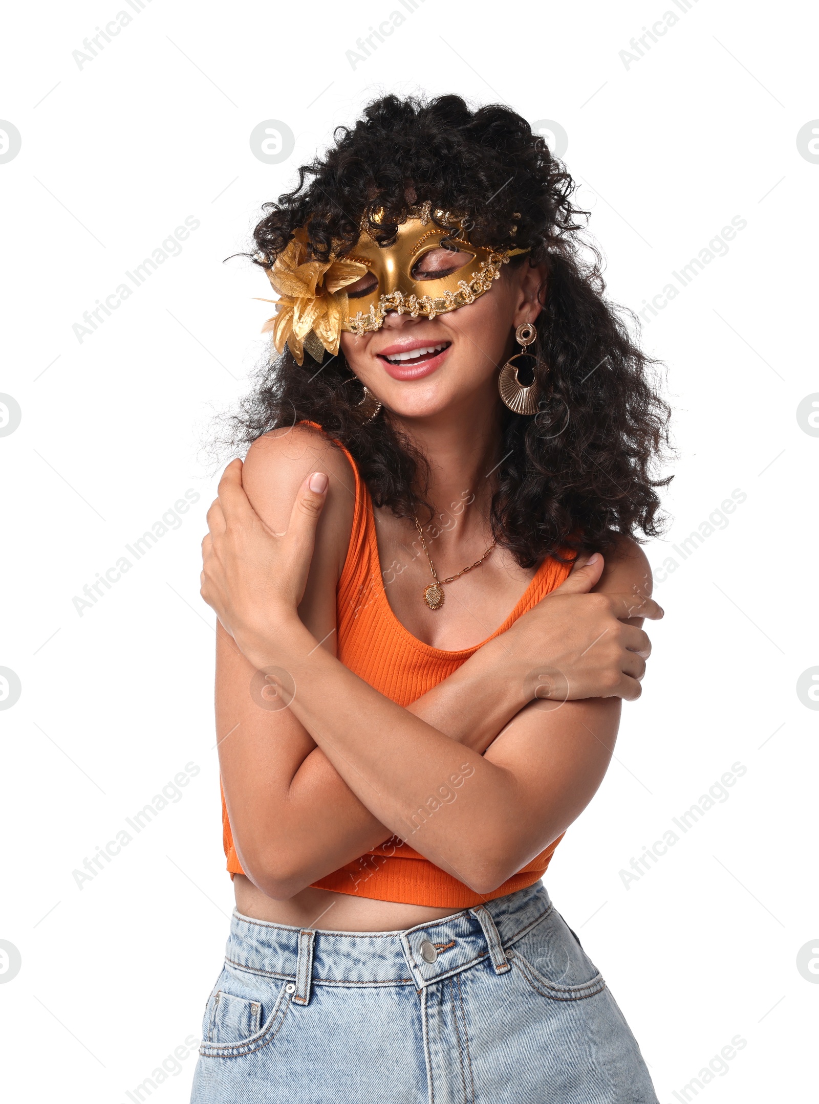 Photo of Smiling young woman wearing carnival mask on white background