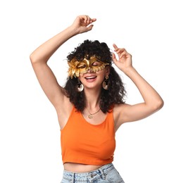 Smiling young woman in carnival mask isolated on white