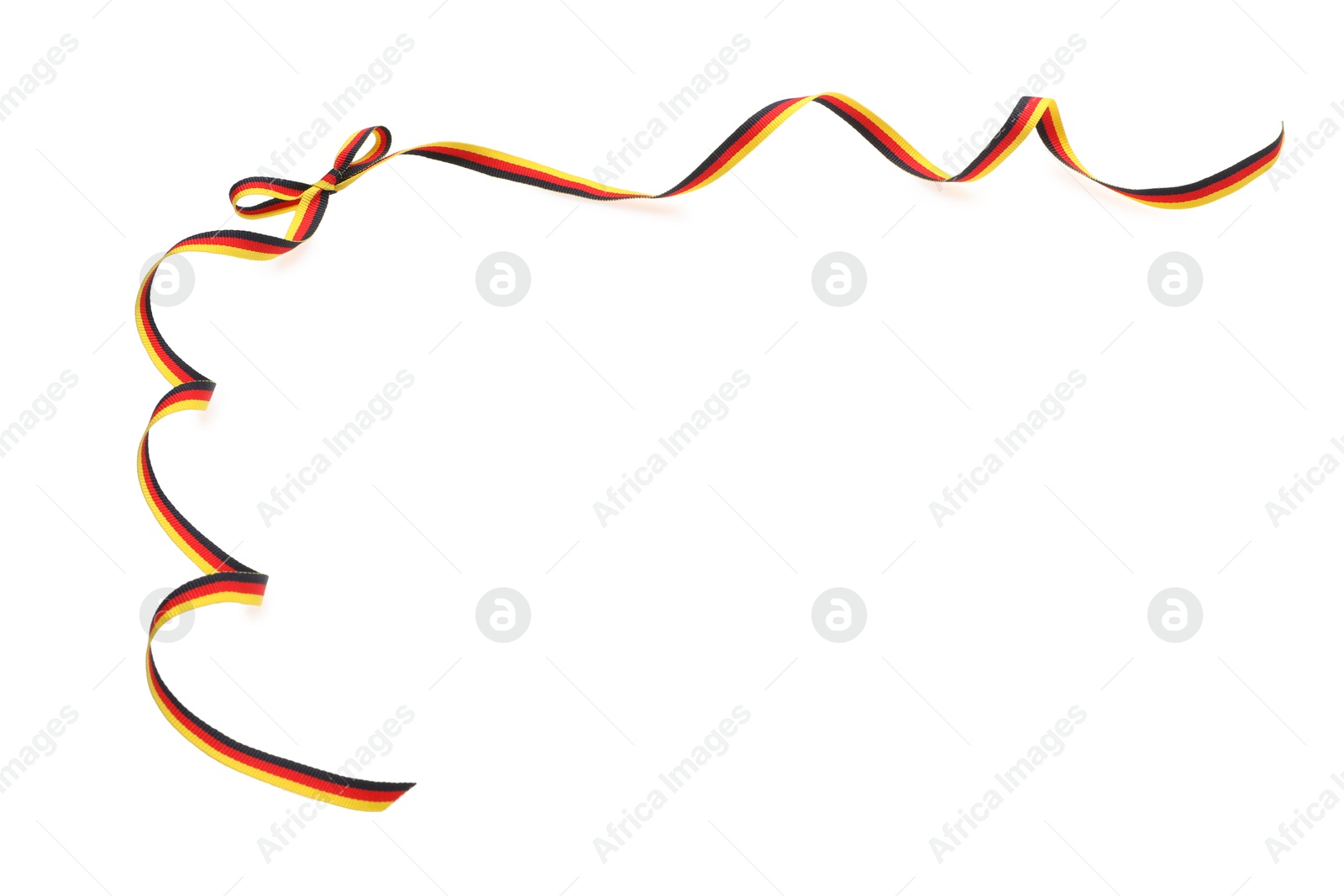 Photo of Ribbon with bow in colors of German flag isolated on white, top view