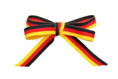 Photo of Bow in colors of German flag isolated on white, top view