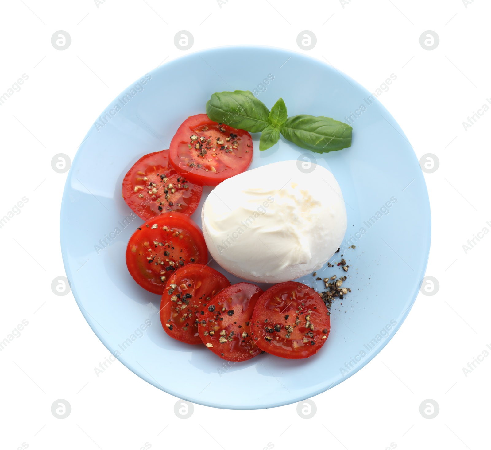 Photo of Delicious burrata cheese, tomatoes, basil and spices isolated on white, top view