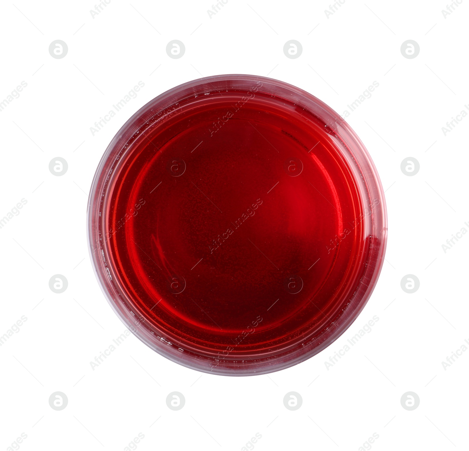 Photo of Fresh grape juice in glass isolated on white, top view