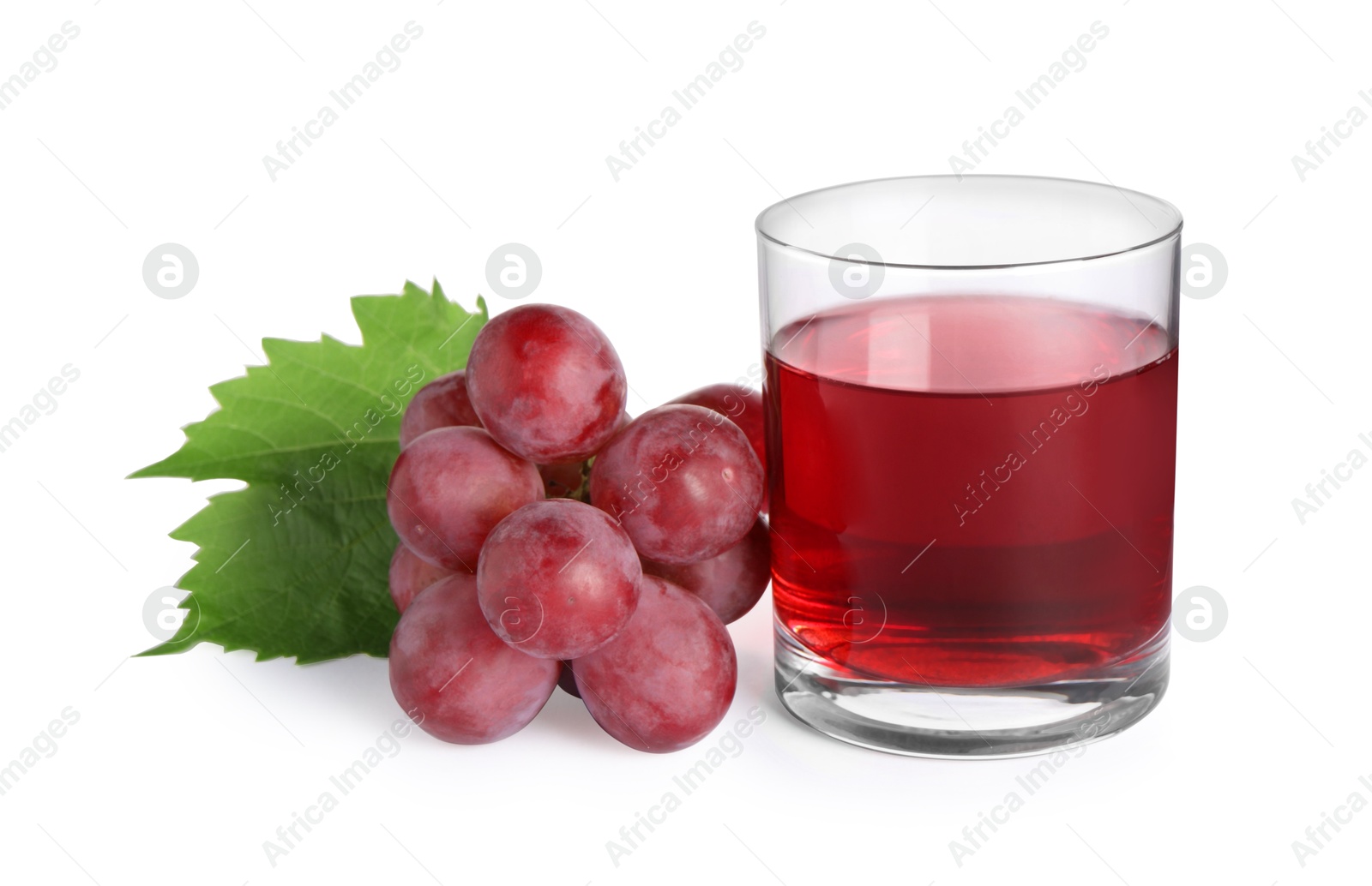 Photo of Tasty juice in glass, fresh grapes and leaf isolated on white