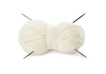 Photo of Skein of soft yarn and knitting needles isolated on white