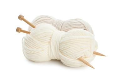 Photo of Skeins of soft yarn and knitting needles isolated on white