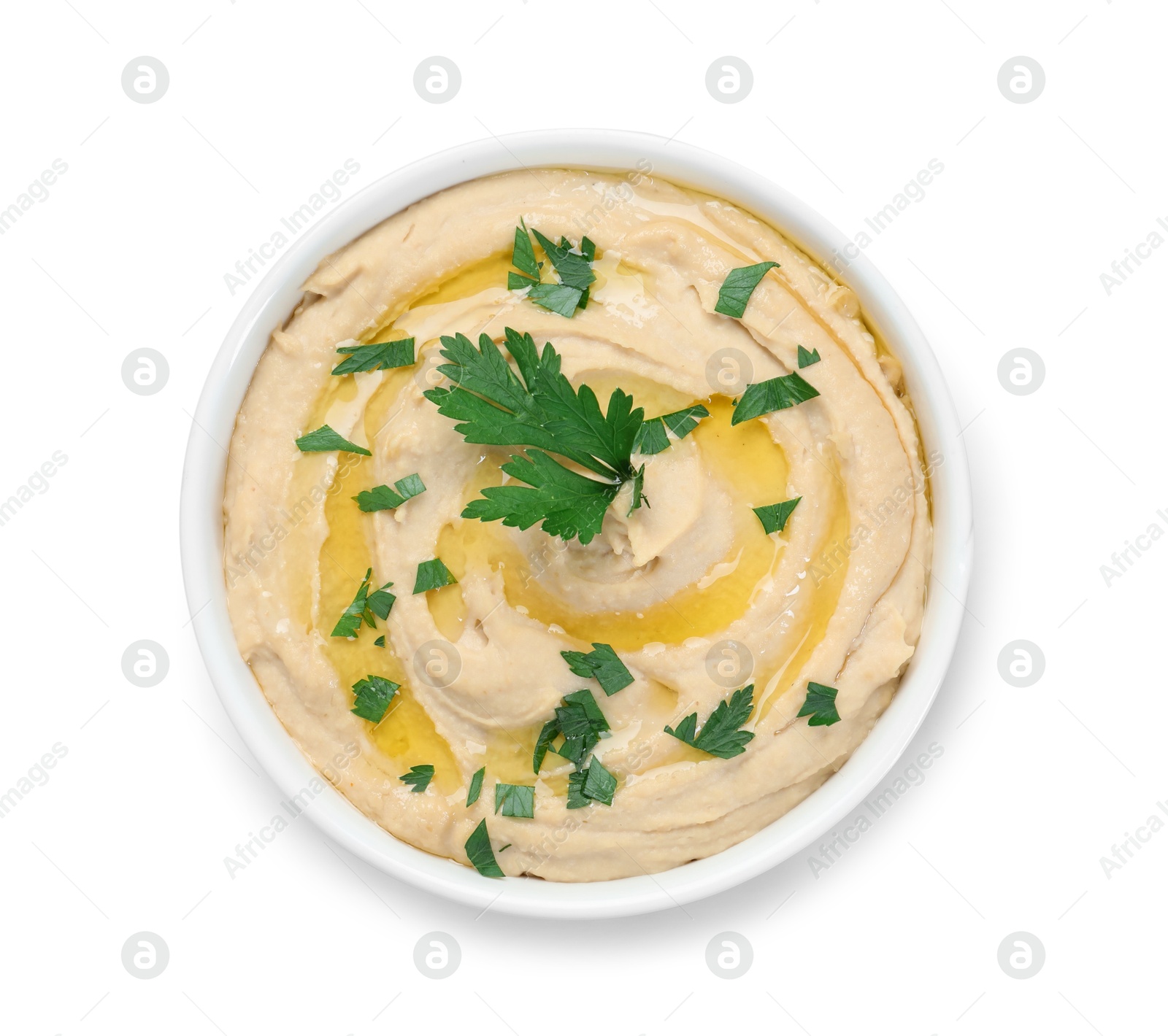 Photo of Delicious hummus with olive oil and parsley isolated on white, top view