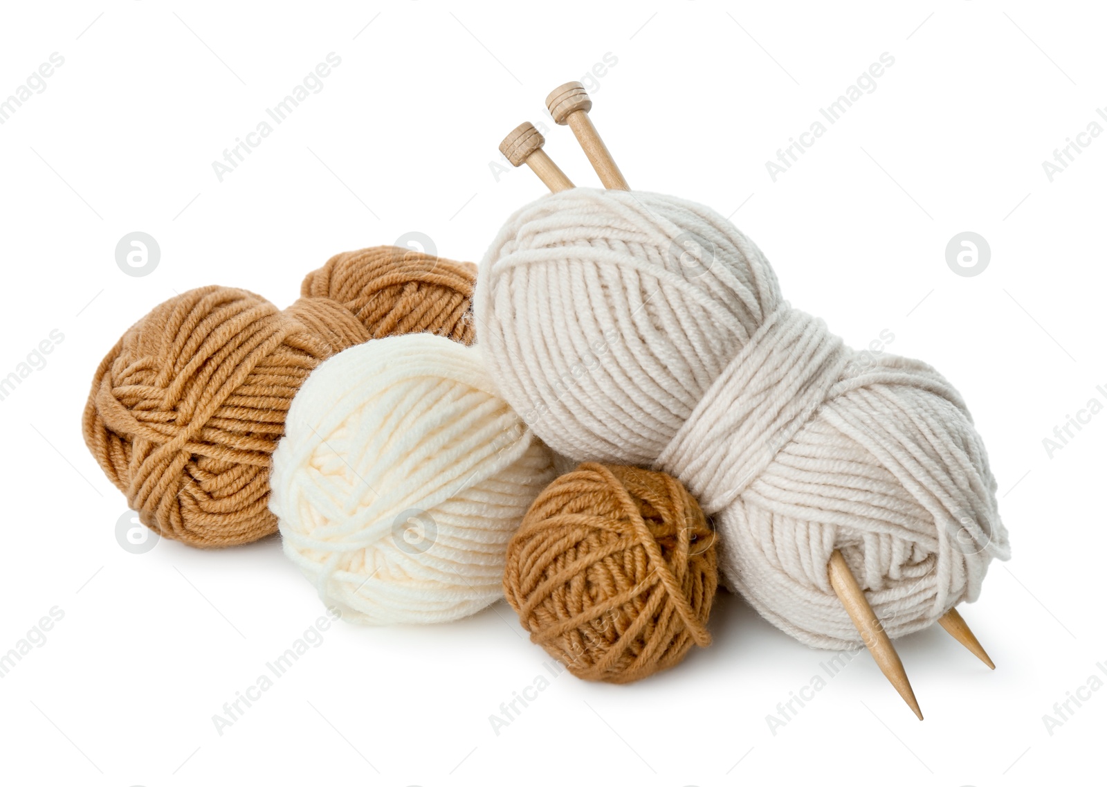 Photo of Skeins of soft yarn and knitting needles isolated on white