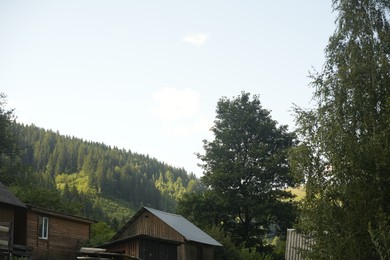 Beautiful view of houses and trees in mountains