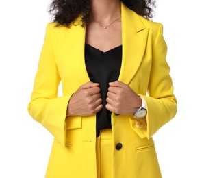 Woman in stylish yellow suit isolated on white, closeup