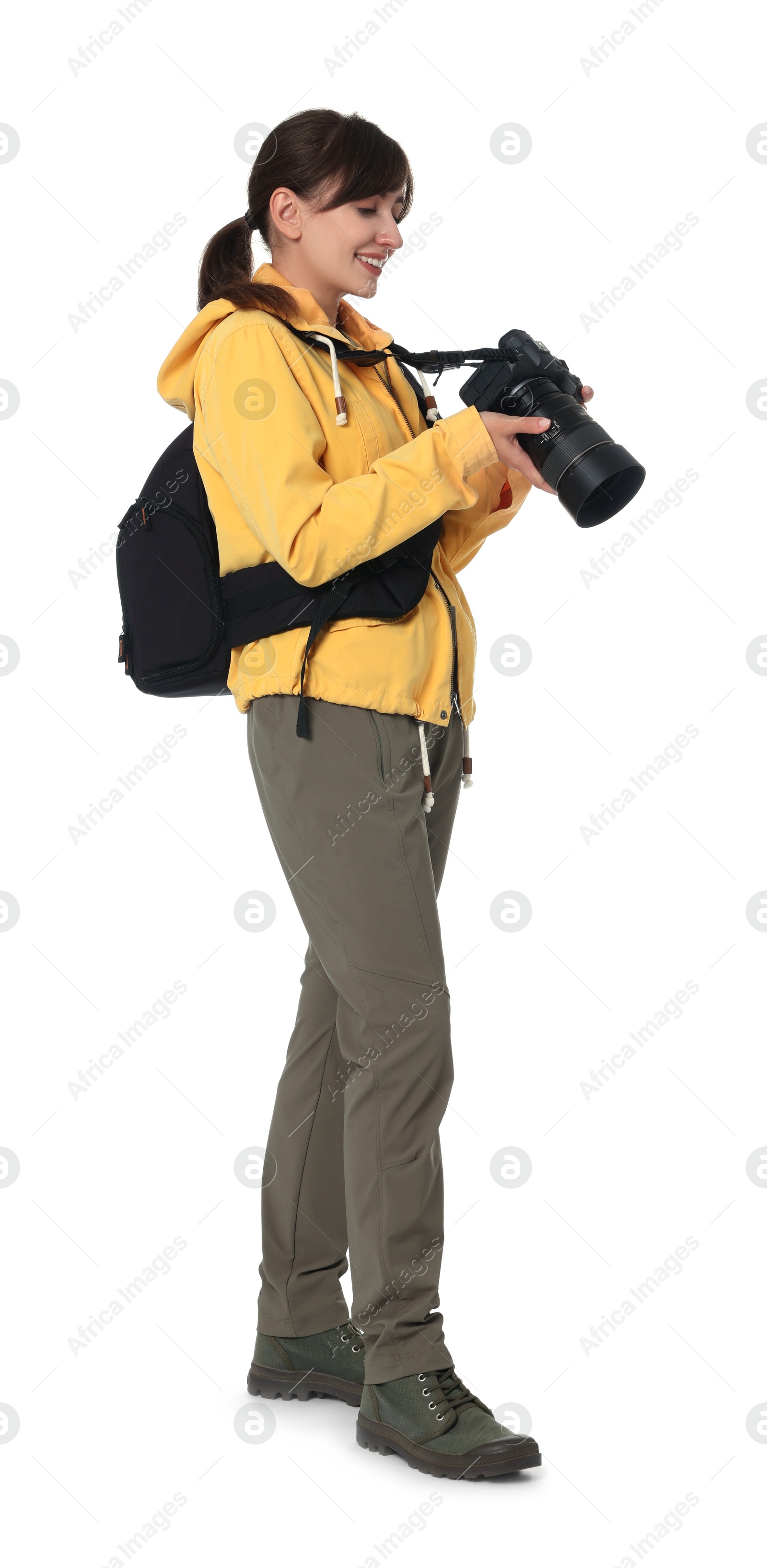 Photo of Photographer with backpack and camera on white background