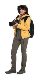 Photographer with backpack and camera on white background