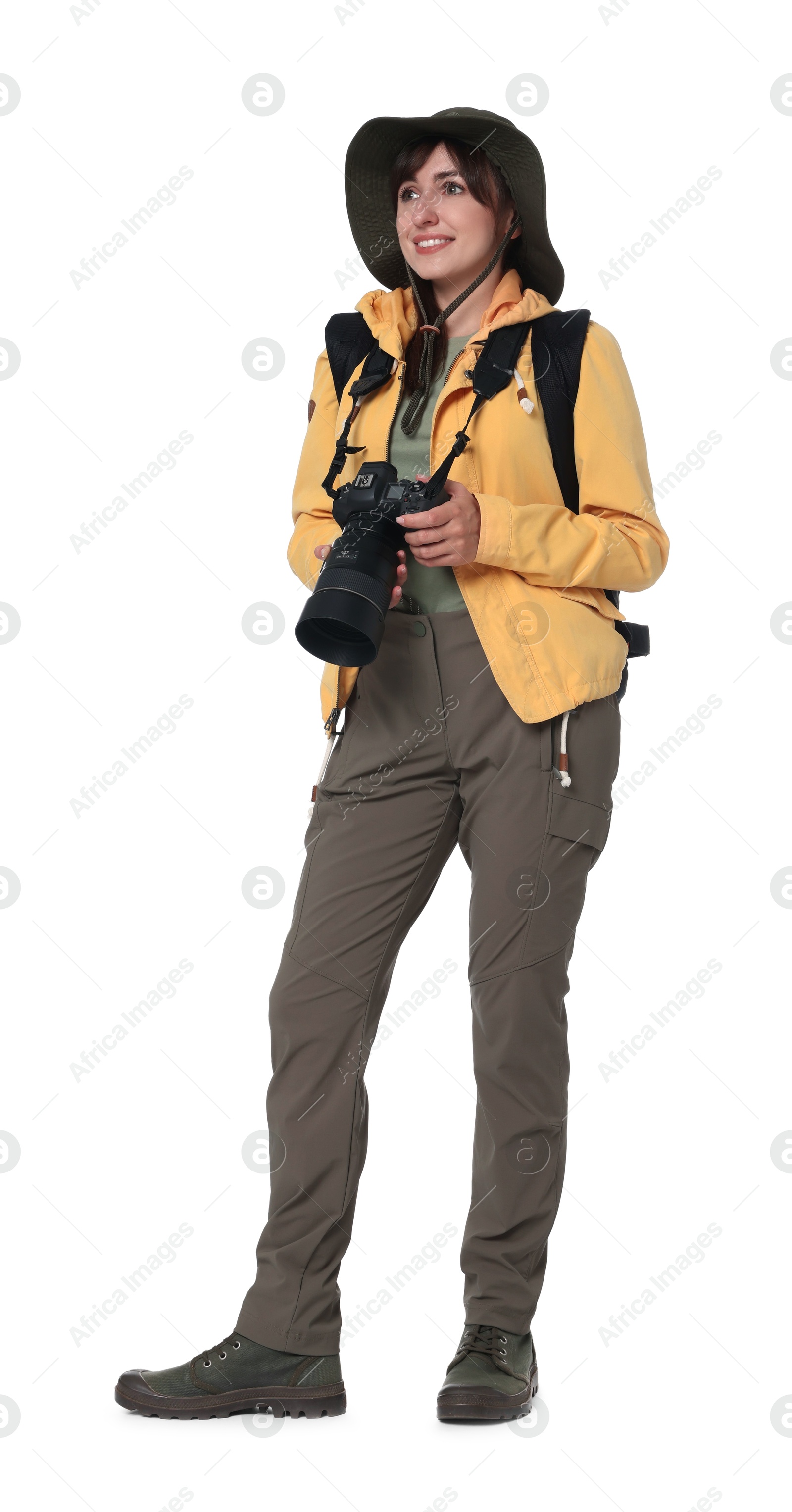 Photo of Photographer with backpack and camera on white background