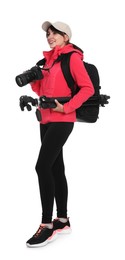 Photo of Photographer with backpack, camera and other professional equipment on white background