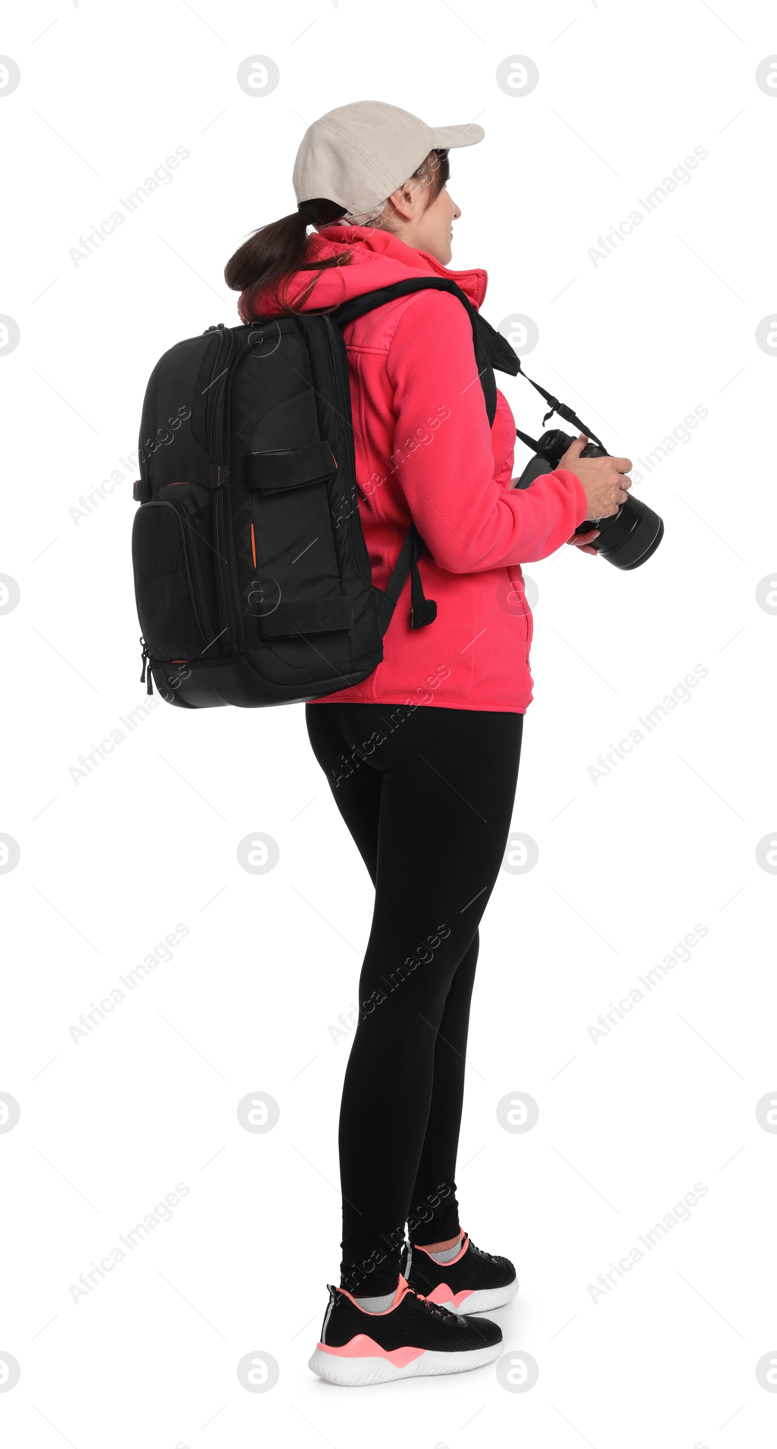 Photo of Photographer with backpack and camera on white background