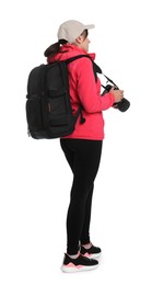 Photo of Photographer with backpack and camera on white background