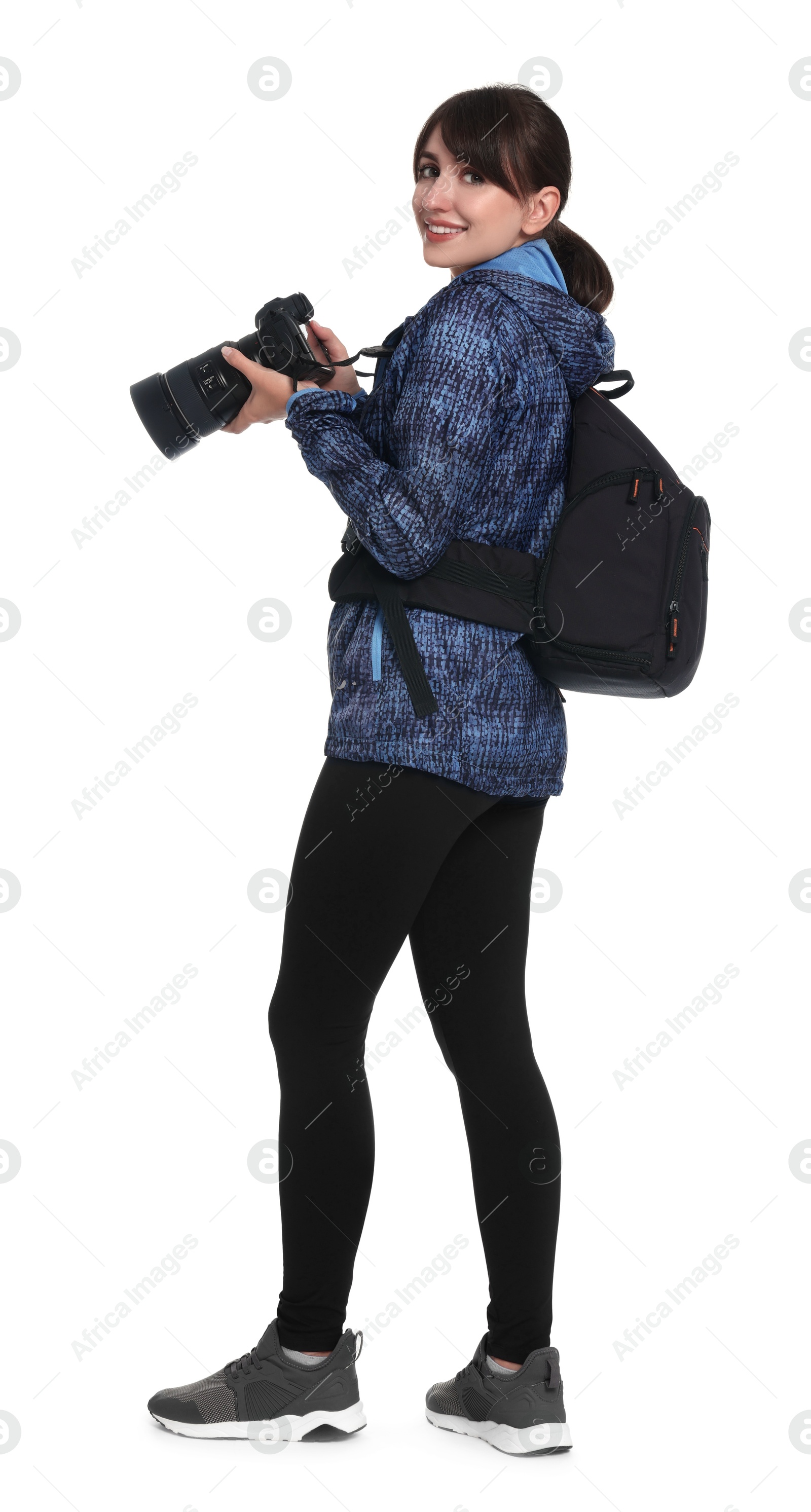 Photo of Photographer with backpack and camera on white background