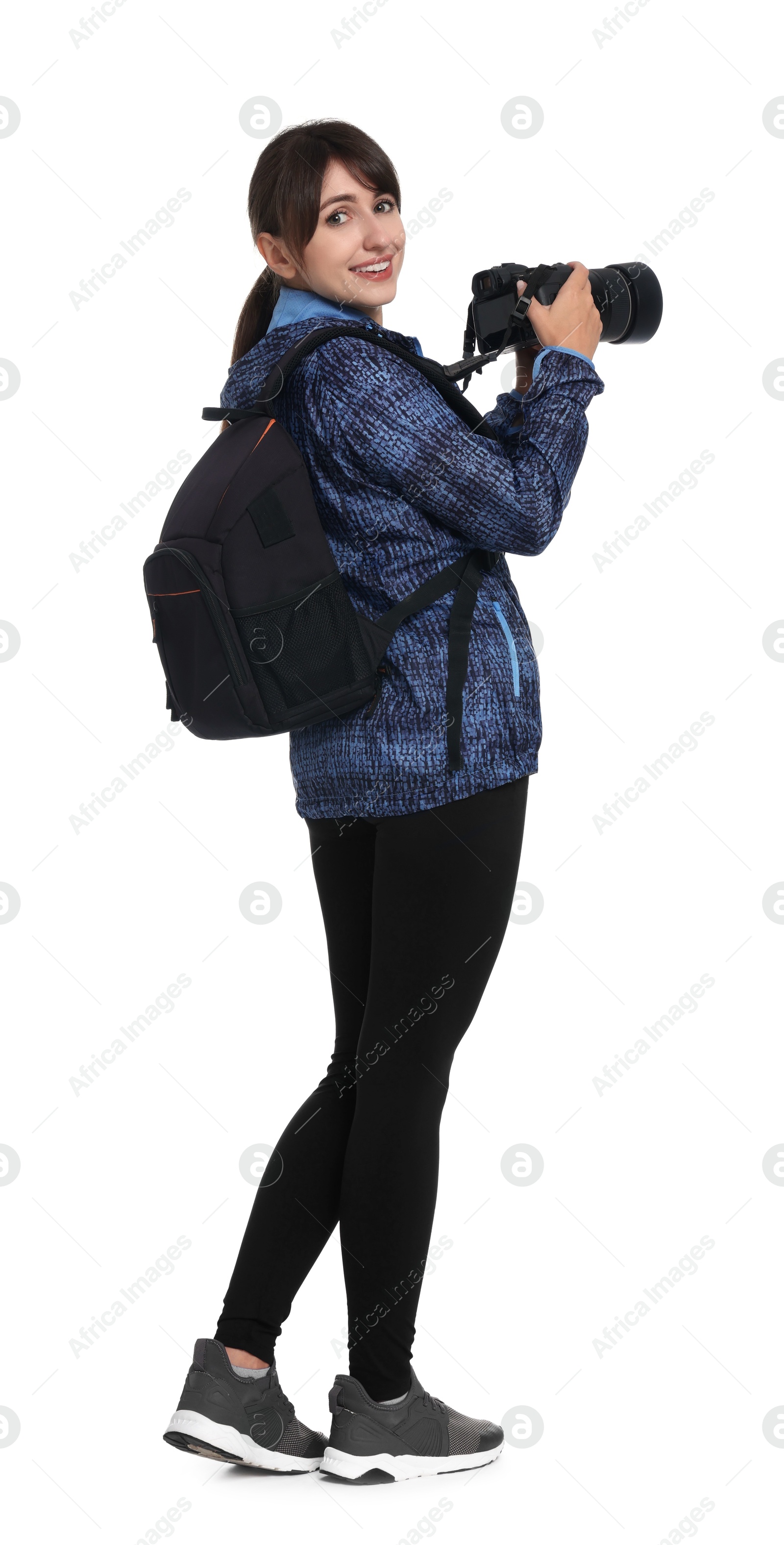 Photo of Photographer with backpack and camera on white background