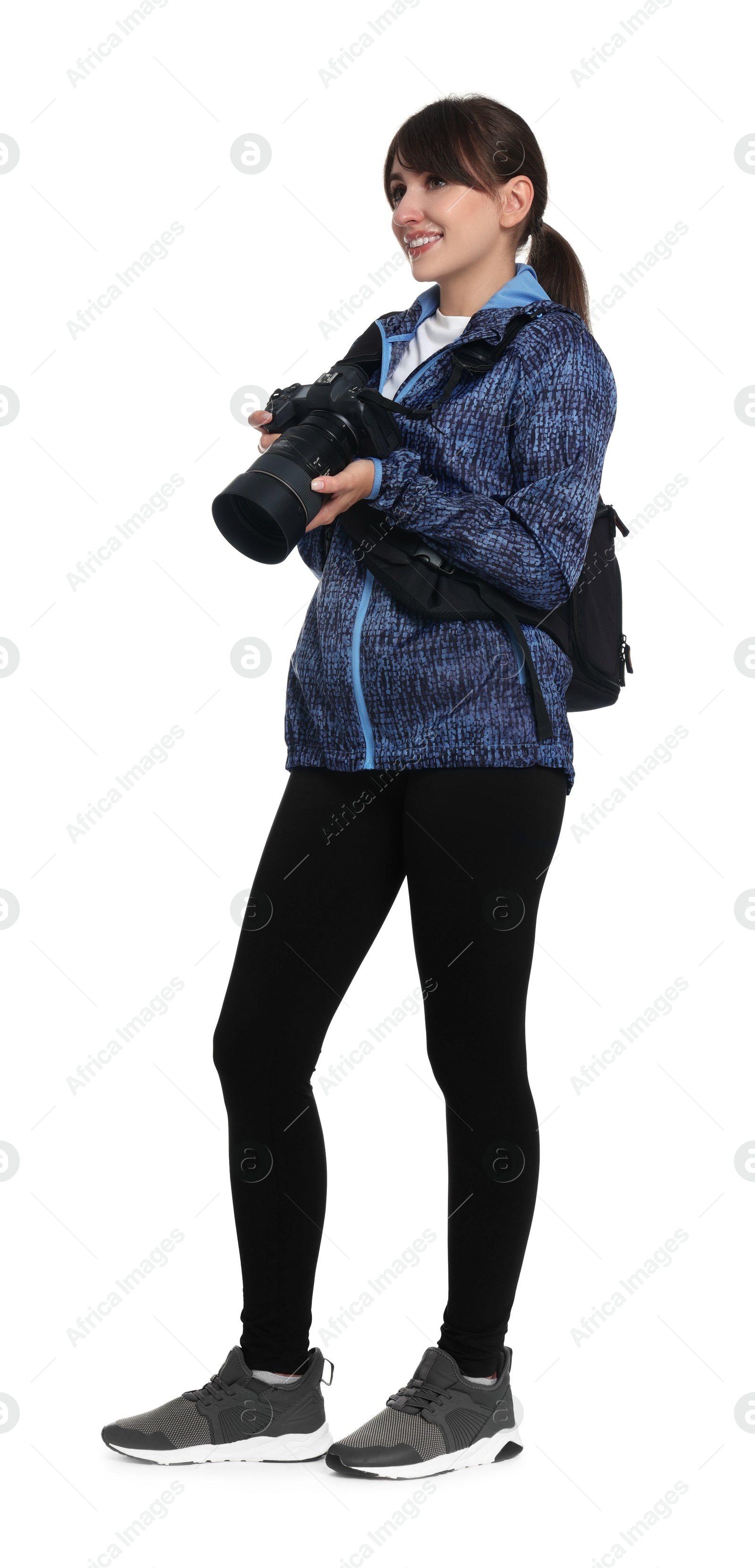 Photo of Photographer with backpack and camera on white background