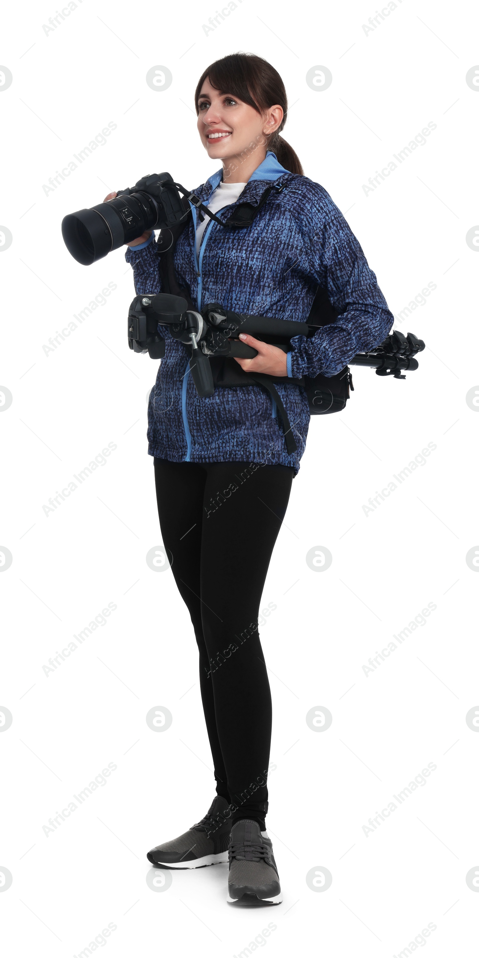 Photo of Photographer with backpack, camera and other professional equipment on white background