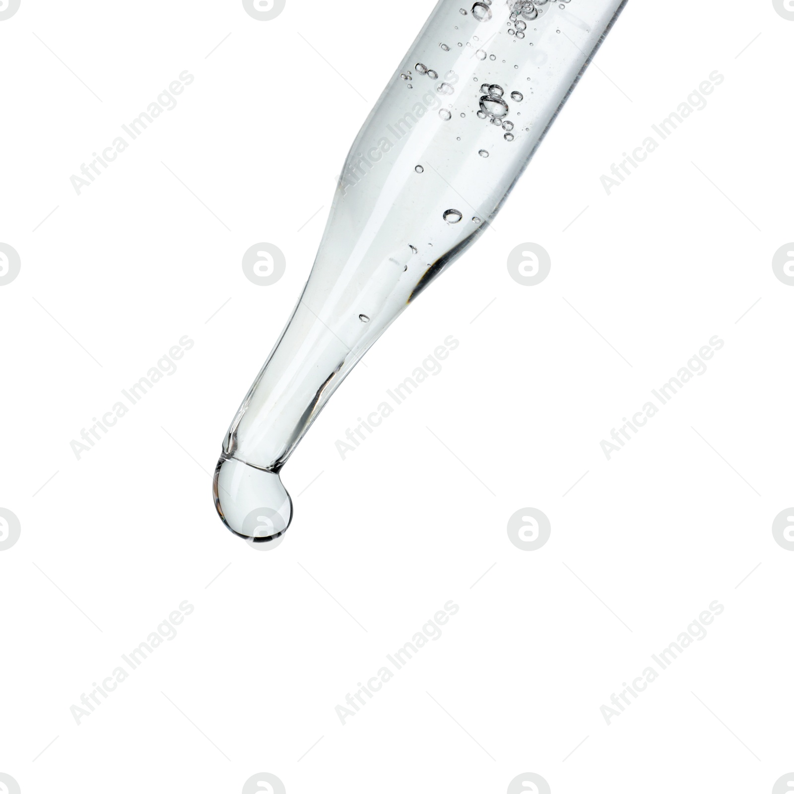 Photo of Dripping cosmetic serum from pipette on white background