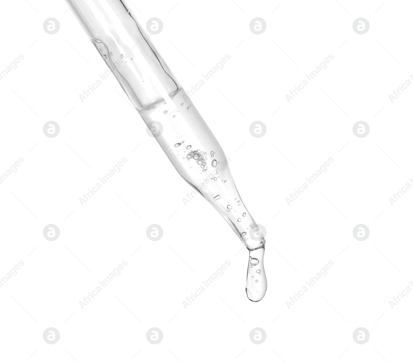 Photo of Dripping cosmetic serum from pipette on white background