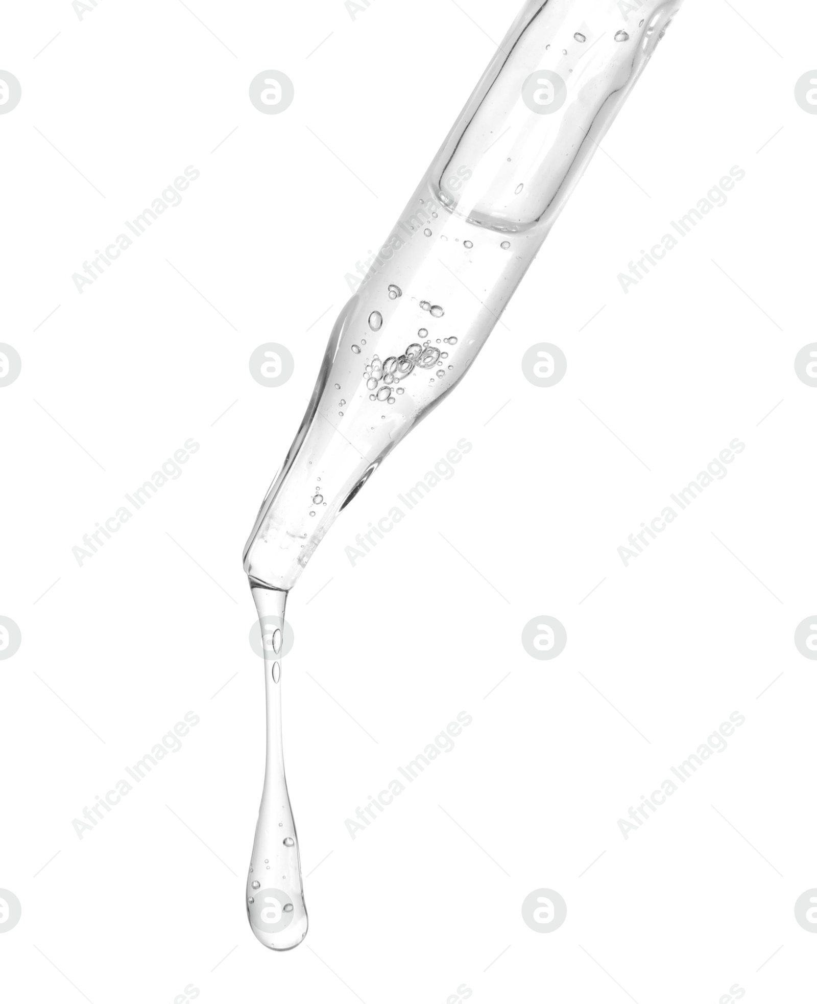 Photo of Dripping cosmetic serum from pipette on white background