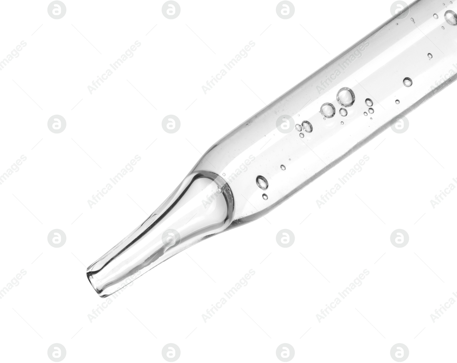 Photo of Dripping cosmetic serum from pipette on white background