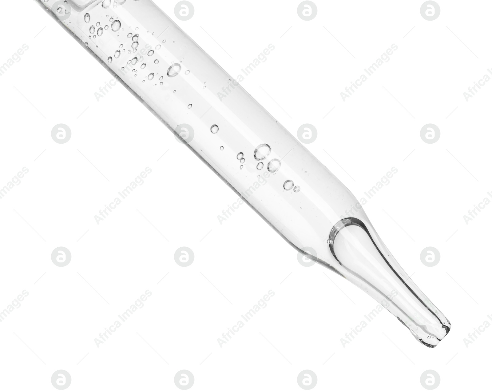 Photo of Dripping cosmetic serum from pipette on white background