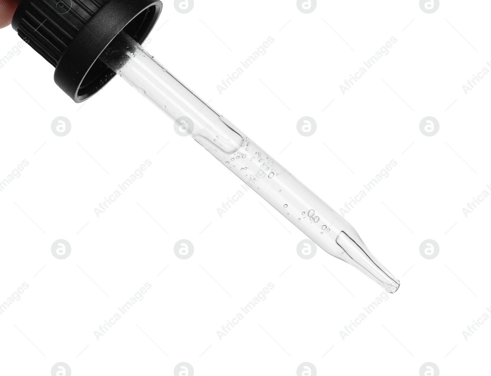 Photo of Dripping cosmetic serum from pipette on white background