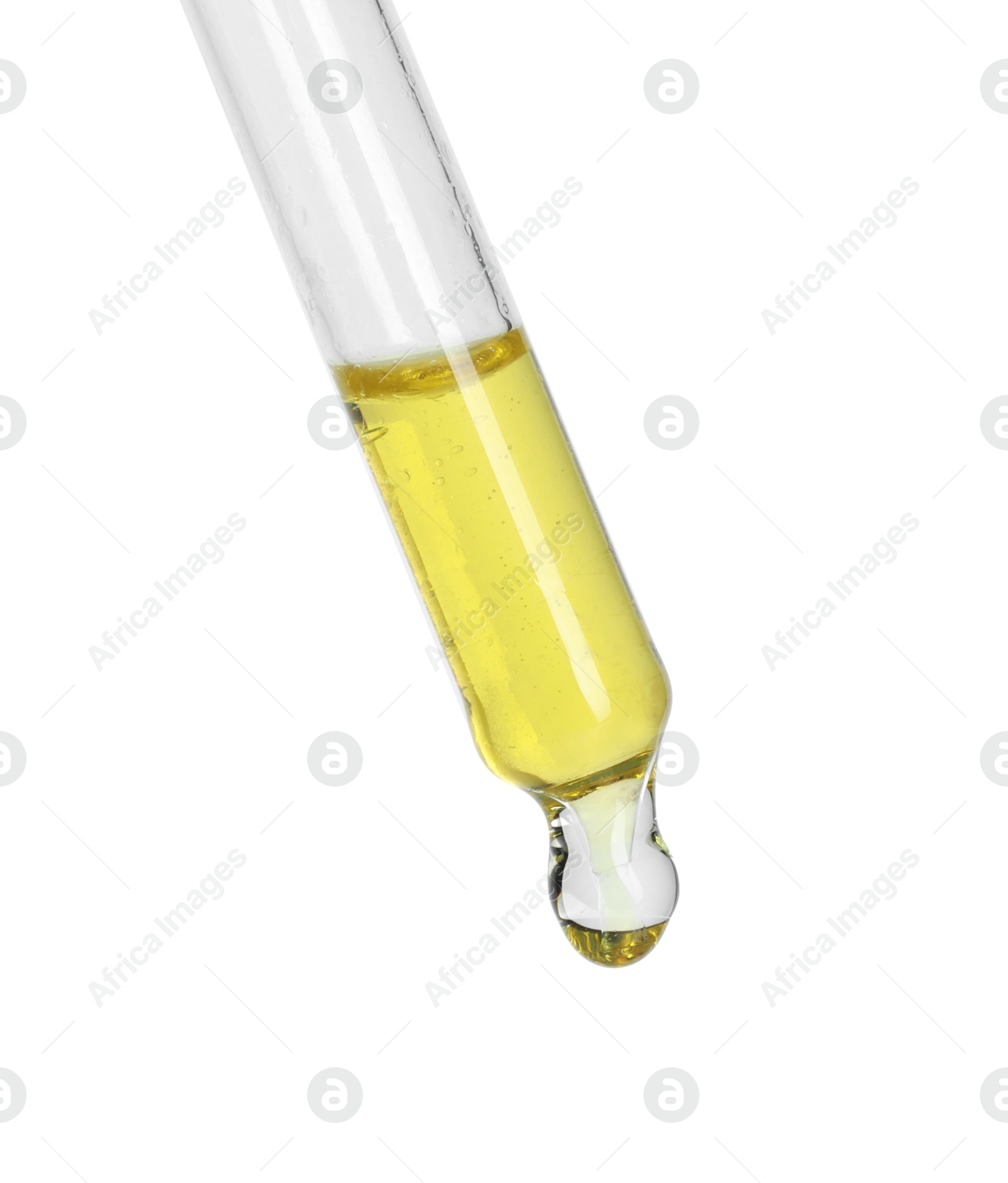 Photo of Dripping essential oil from pipette on white background