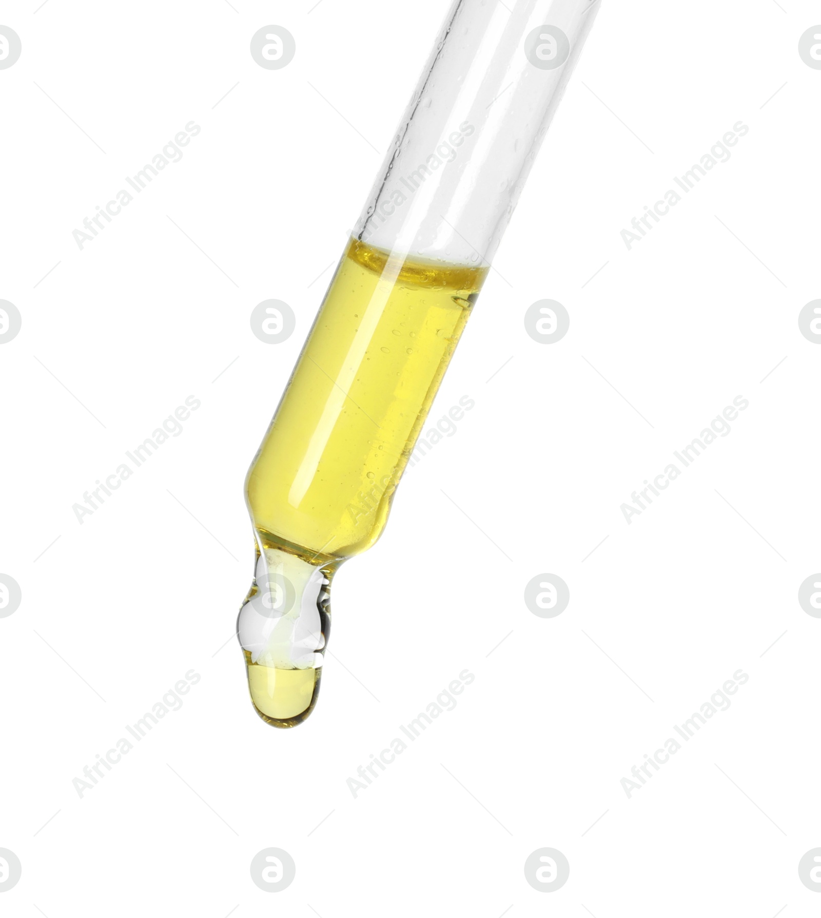 Photo of Dripping essential oil from pipette on white background