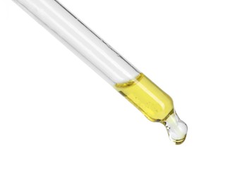 Photo of Dripping essential oil from pipette on white background