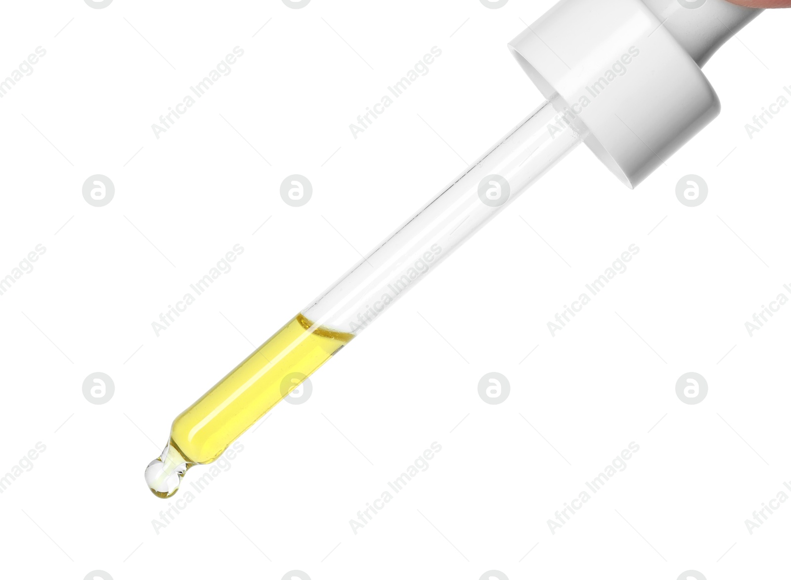 Photo of Dripping essential oil from pipette on white background