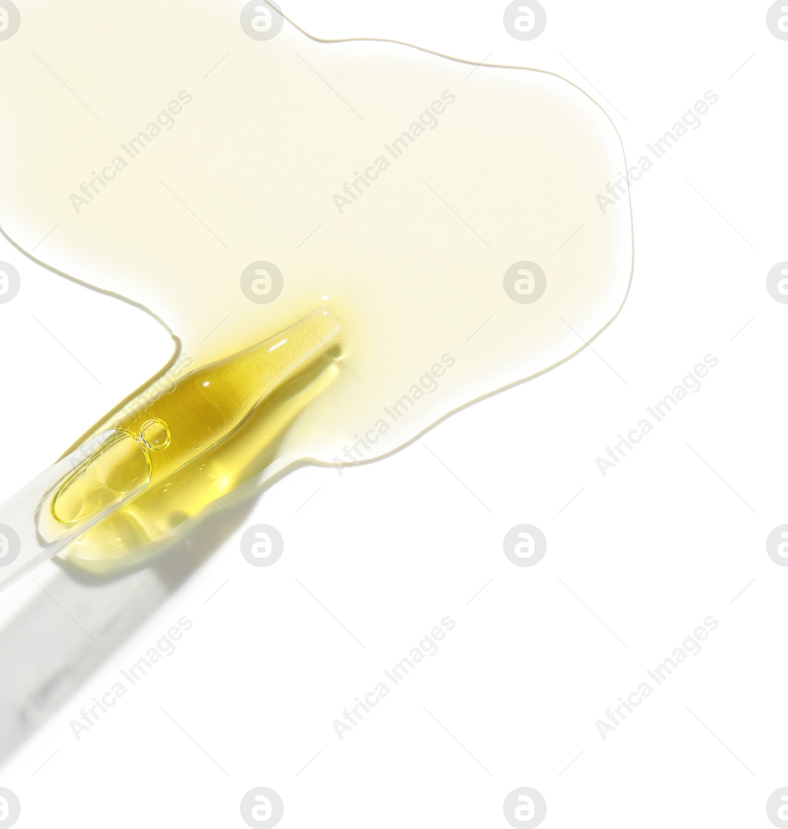 Photo of Cosmetic oil and pipette isolated on white, top view