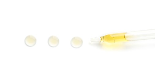 Cosmetic oil and pipette isolated on white, top view