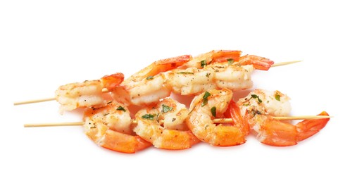 Photo of Skewers with delicious grilled shrimps isolated on white, top view