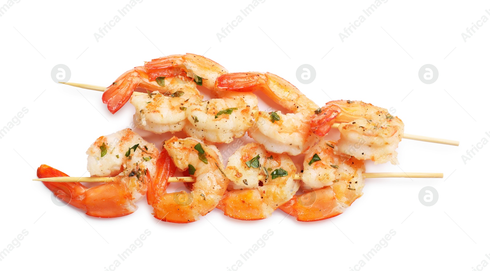 Photo of Skewers with delicious grilled shrimps isolated on white, top view