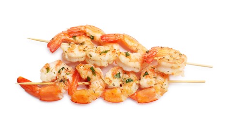 Photo of Skewers with delicious grilled shrimps isolated on white, top view