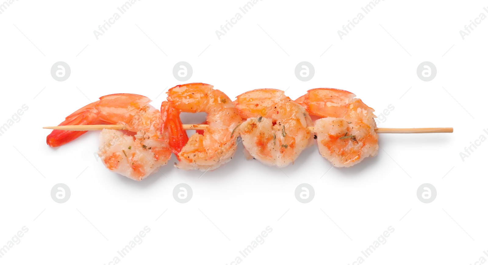 Photo of Skewer with delicious grilled shrimps isolated on white, top view